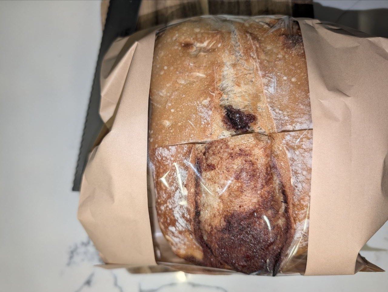 Sliced sourdough loaf on a cutting board